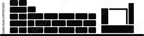 Black and White Silhouette of a Brick Wall Under Construction with Building Materials