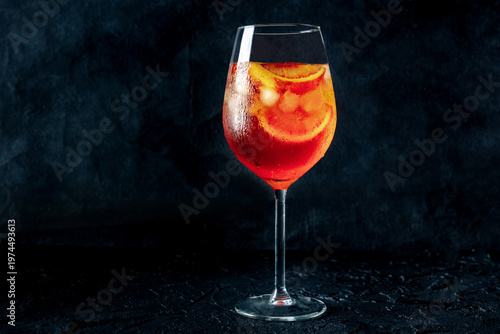 Wallpaper Mural Aperol Spritz, cocktail with sparkling wine, side view on a dark background, with copy space Torontodigital.ca