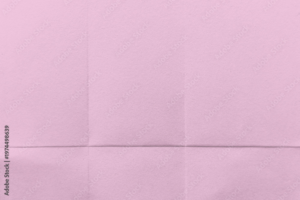 Fototapeta premium Textured pink paper background with copy space