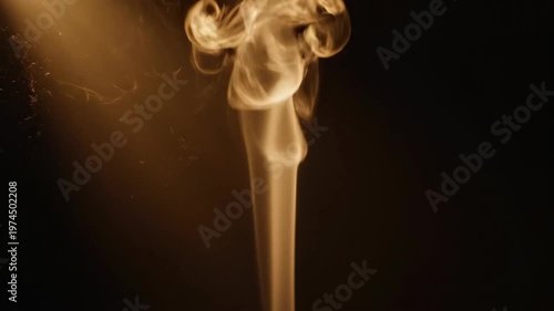 Mesmerizing Golden Smoke Rising and Swirling Against a Dark Background.