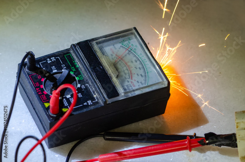Картината върху платно Electrical tester with sparks and overload during system failure and accident