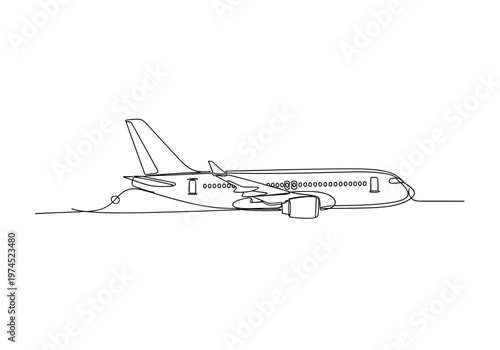 Passenger airplane parked on runway with open cargo door