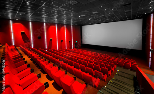 Empty Movie Theater With Seats and Screen