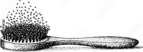 Hair brush scattering lint and dust on white surface