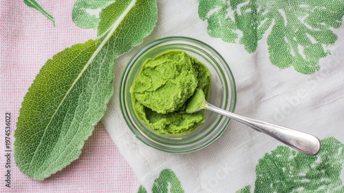 Fresh green herbal paste on a linen cloth, a natural remedy prepared. lifestyle magazines, social media lookbooks, designed for influencer and brand collaborations.