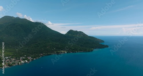 Wallpaper Mural Blue ocean with waves against the sky and clouds in tropical island. Camiguin Island. Philippines. Torontodigital.ca