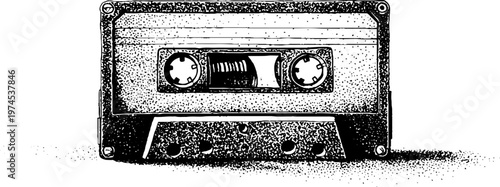 Cassette tape lying stationary on white textured surface