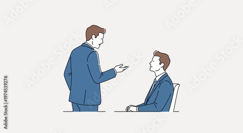 Businessmen in a meeting, one standing and talking, the other sitting and listening.