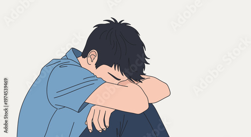 Sad Young Man Hiding Face in Arms, Feeling Lonely and Depressed