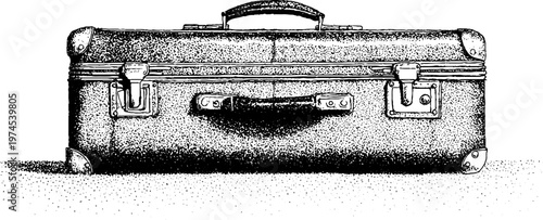 Vintage suitcase closed resting on flat surface in studio