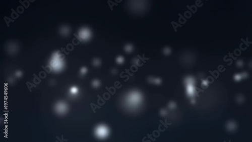 Soft glowing particles floating in a dark background. Ideal for creating a dreamy atmosphere in videos and presentations