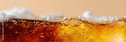 Panel kuchenny z motywem Close up of cola surface with ice and rising bubbles in amber light macro view of carbonated drink texture and foam detail