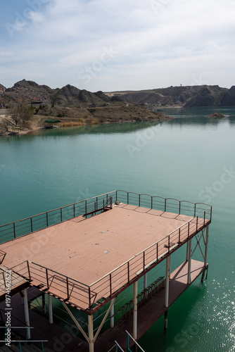 Panoramic view of the coastline and rocky cliffs at Qonayev (Kapchagay), Central Asia