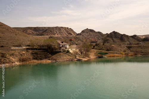 Panoramic view of the coastline and rocky cliffs at Qonayev (Kapchagay), Central Asia