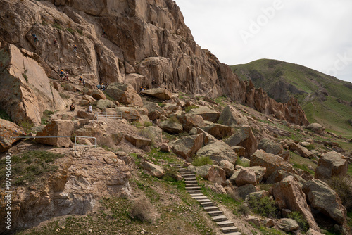 Majestic red rock formations and Buddhist petroglyphs site at Tamgaly Tas. Ili River landscape