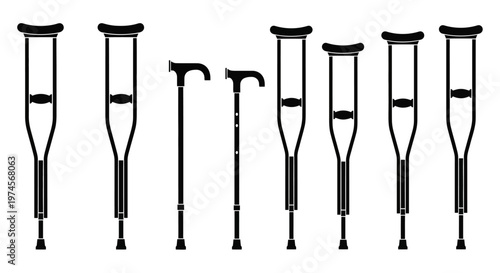 Crutches and walking sticks arranged.