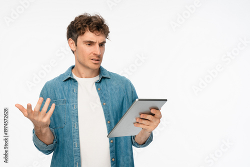 Tablet, confused and studio with man portrait. Internet software glitch, planning or troubleshooting, confused with coding mistake, system solution or test on white background copy space