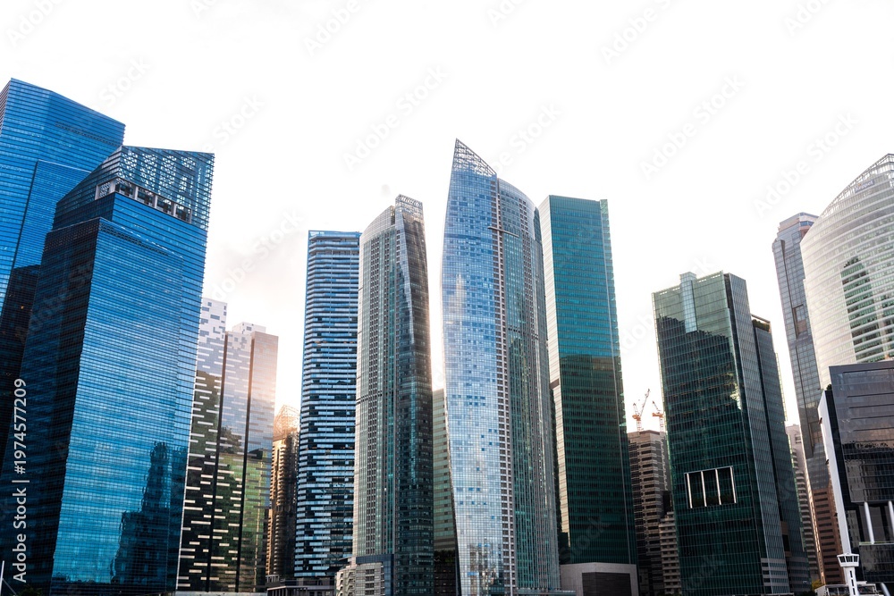 Obraz premium Modern skyscrapers under cloudy sky