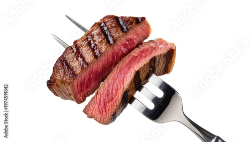 Fotografie Juicy grilled beef steak slices on fork, isolated on transparent background