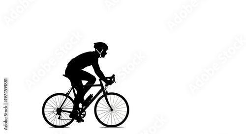 Silhouette of a cyclist on a road bike, wearing a helmet, in motion