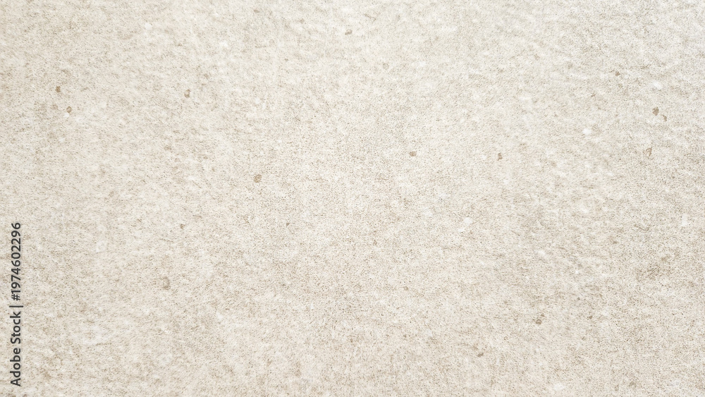 Fototapeta premium Raw concrete wall texture with visible wear and natural imperfections, ideal for architectural visualization and industrial backgrounds.
