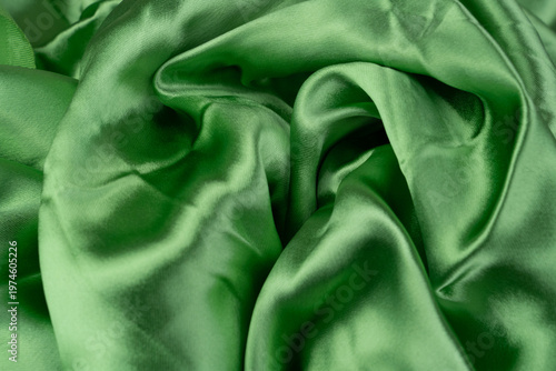 wavy satin vibrant green fabric background