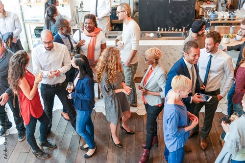 Photos Diverse group socializing at event
