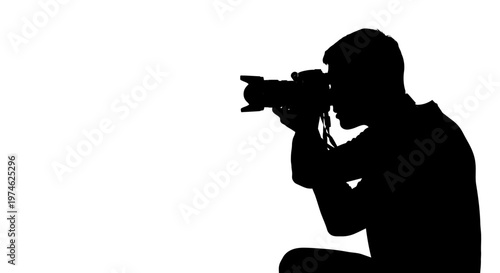 Silhouette of a photographer taking a picture with a professional camera, isolated on white background.