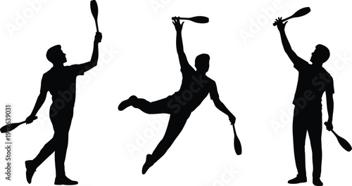 Juggling Performer Silhouettes Throwing Pins in Air