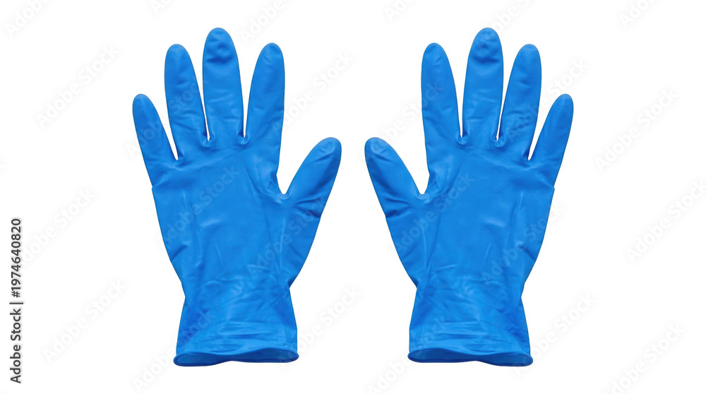 Fototapeta premium Two blue gloves laid flat on white background