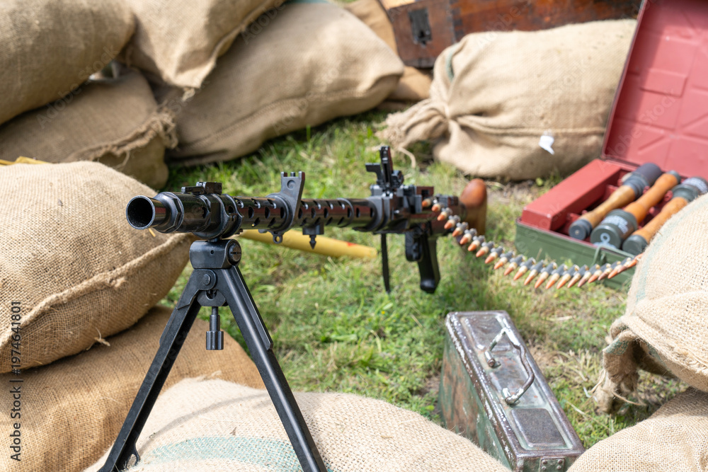 Fototapeta premium WWII German MG 34 machine gun with ammunition and military equipment