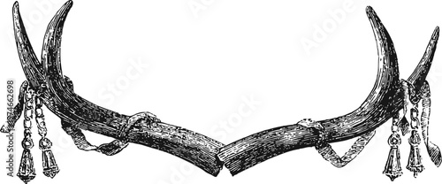 Antique deer antlers decoration with hanging tassels and ornate metal chains