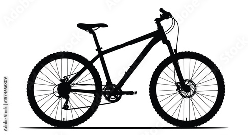 Silhouette of a mountain bike against a plain white background side view