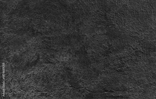 Dark cement wall background in vintage style for graphic design or wallpaper.