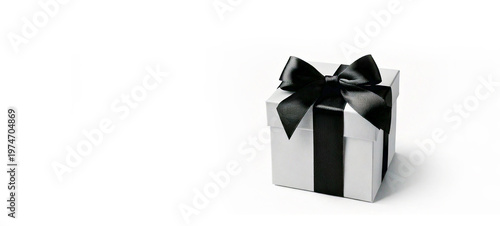 White gift box with black bow. Surprise. No white background isolated.