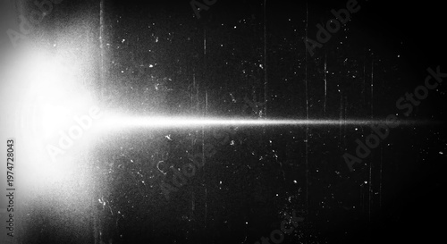 Vintage Monochrome Film Grain Effect Background with Light Bleed and Lens Flare Effect