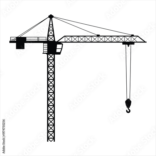Silhouette of a large tower crane with its hook ready for heavy lifting at a construction site