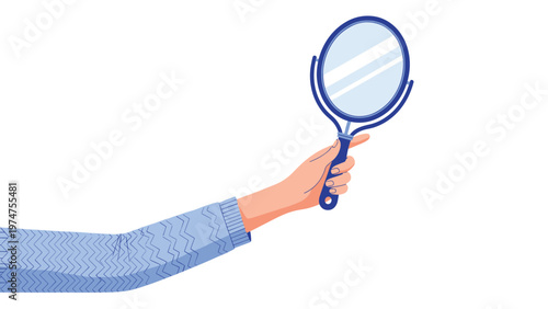 Hand wearing a light blue knitted sweater holding a round hand mirror with a blue frame showing a bright white reflection.