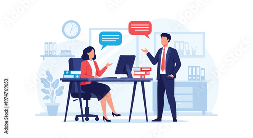 Business colleagues discuss work projects while standing and sitting in a modern corporate office environment with a computer desk.