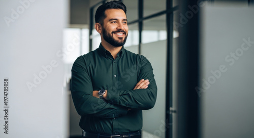 Corporate portrait of European confident student, trade manager businessman standing crossed arms in office. Young latin hispanic specialist business man employee smiling dreaming away. Copy space