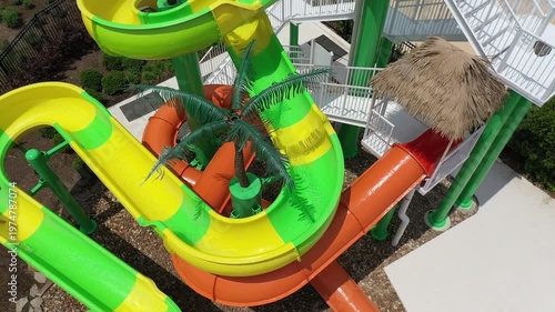 Wallpaper Mural An arial shot of a young girl sliding down a massive water slide. Torontodigital.ca