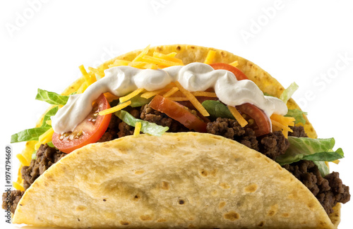 Delicious beef taco with lettuce, cheese, tomato and sour cream isolated  traditional Mexican fast food on transparent background