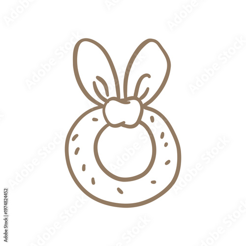 Hand-drawn minimalist doodle of a baby rattle or teething ring with bunny ears. Simple beige line art illustration of newborn toys for nursery and play themes.