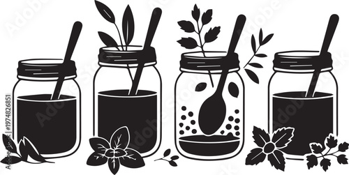 Four jars of homemade herbal infusions with spoons and fresh leaves