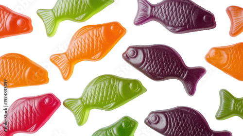 Colorful fish-shaped candies on transparent background