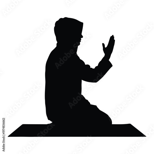 Silhouette of a Muslim man wearing a kufi cap praying on a prayer rug depicting devout religious observance and spiritual connection with hands raised