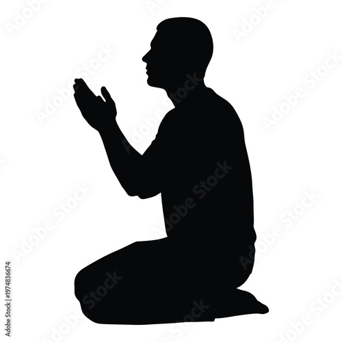 Silhouette of a Muslim man kneeling and praying with hands raised in supplication and devotion a gesture of faith and spirituality in an isolated black graphic