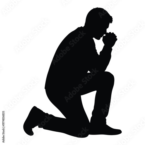Silhouette of a man kneeling and praying with hands clasped together in a gesture of deep devotion and solemn contemplation representing faith