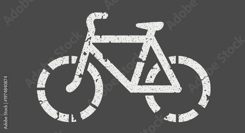 White Bicycle Symbol Painted on Dark Asphalt Road, Indicating a Dedicated Bike Lane for Urban Transportation.