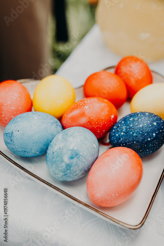 Traditional Easter eggs in blue, red and yellow colors . Close up.
